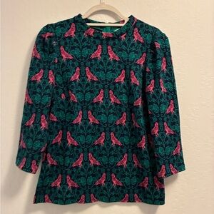 Boden women's top with a green and pink bird print.